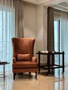 Regal High-Back Armchair in Rich Chestnut Upholstery – Statement Seating